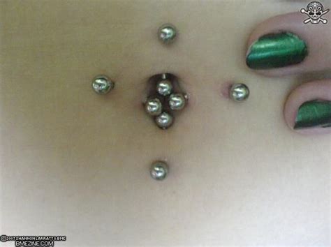 multiple belly button piercings